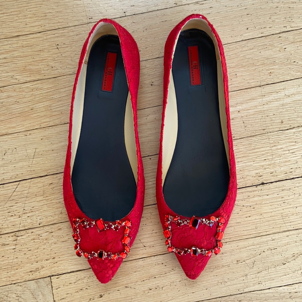 Carolina Herrera red lace flats with red gem stones.